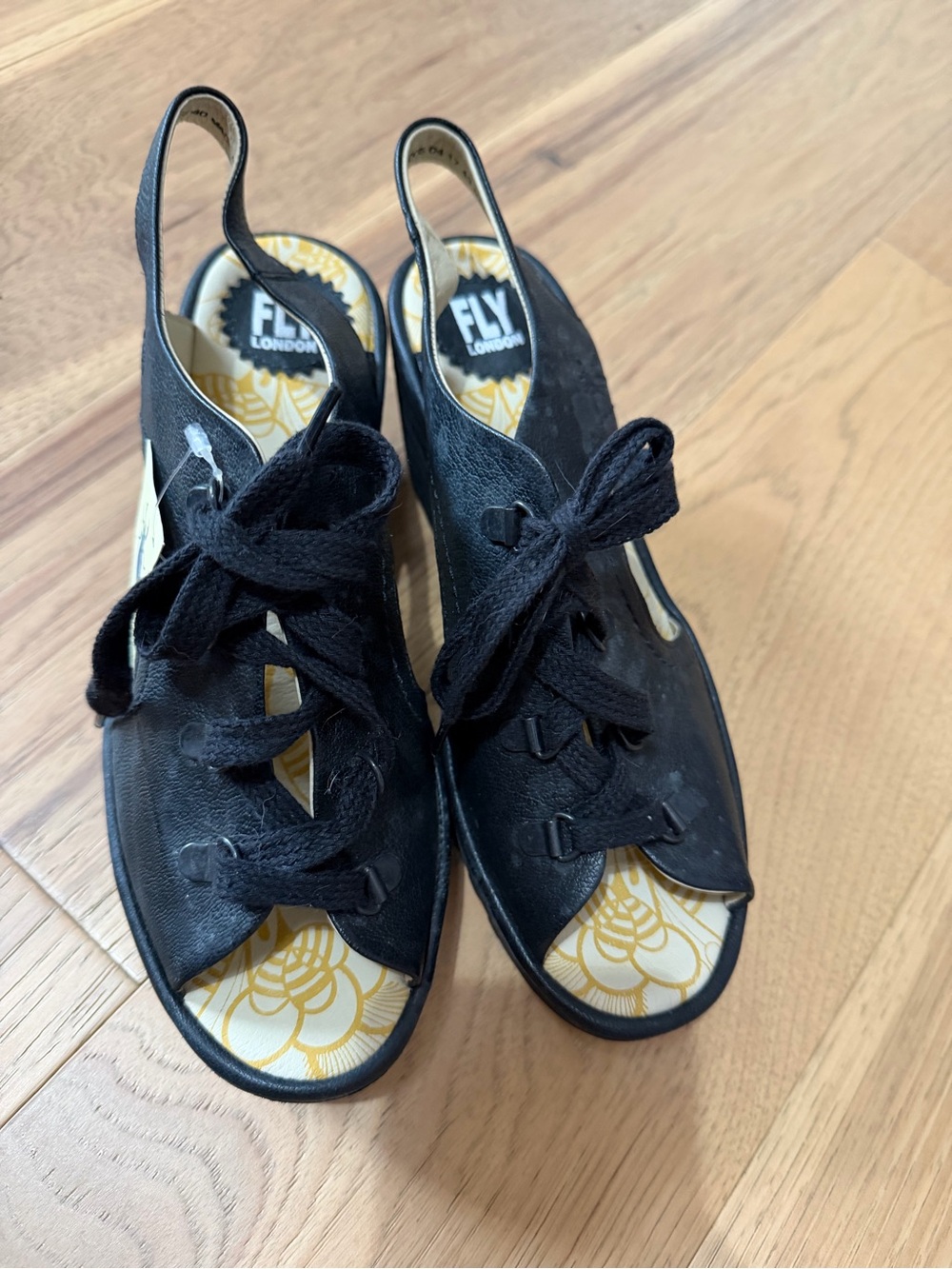 Fly London Black Lace-Up Slingback Mules